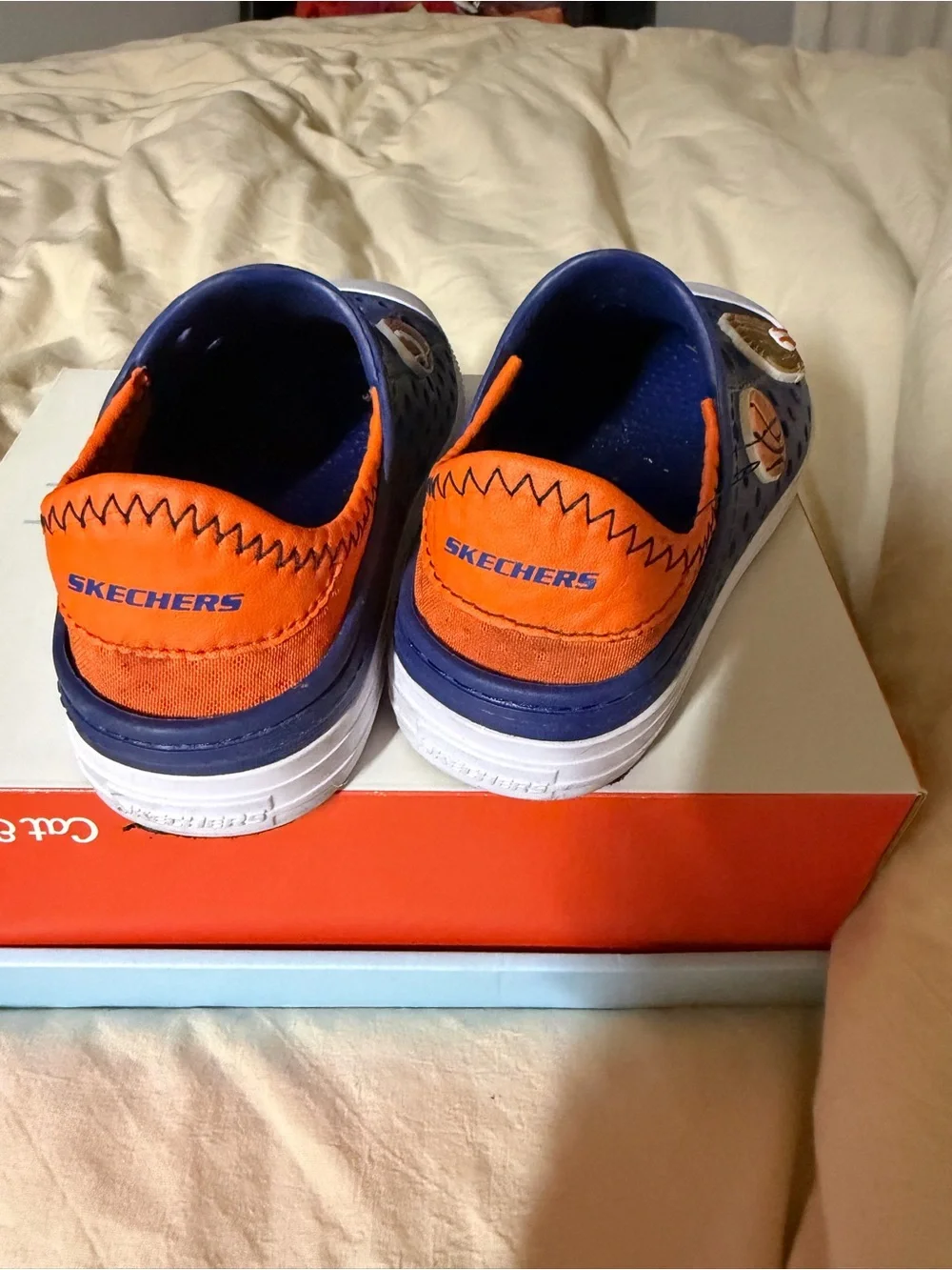Skechers Navy Blue Slip-On Water Shoes with White Toecaps and Orange Lining